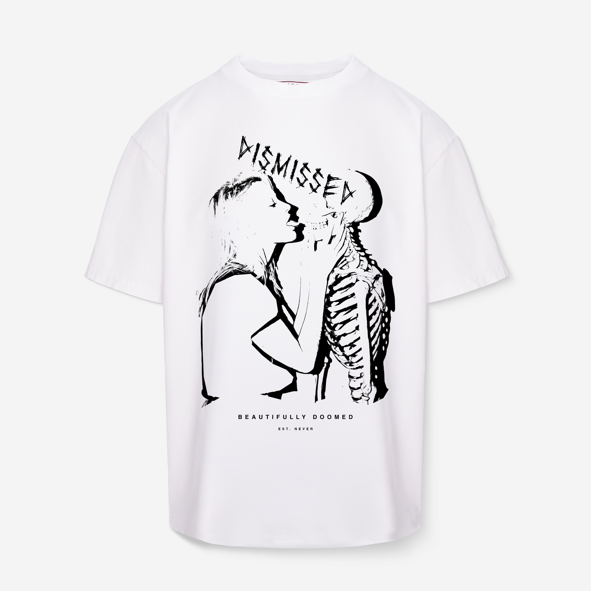 A white short-sleeve t-shirt with a black graphic print on the front showing a woman kissing a skeleton, with the text 'DISMISSED' and 'BEAUTIFULLY DOOMED EST. 2024'.