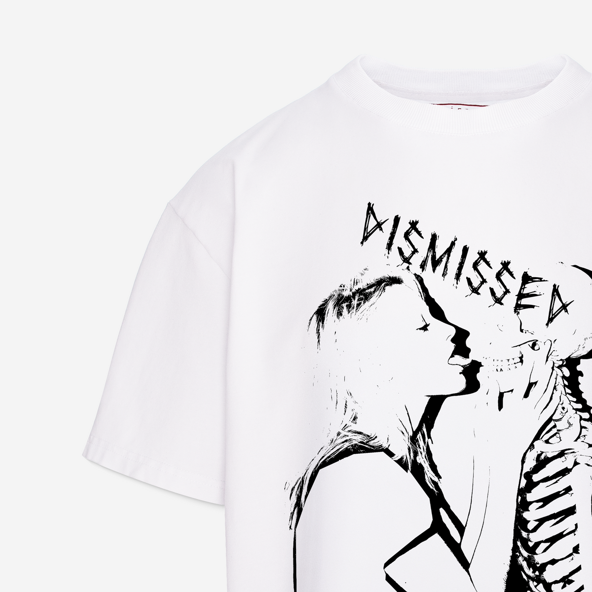 White short-sleeve graphic T-shirt with a black line art print of a woman, a skeleton, and the word 'DISMISSED' across the chest, shown on a light gray background.
